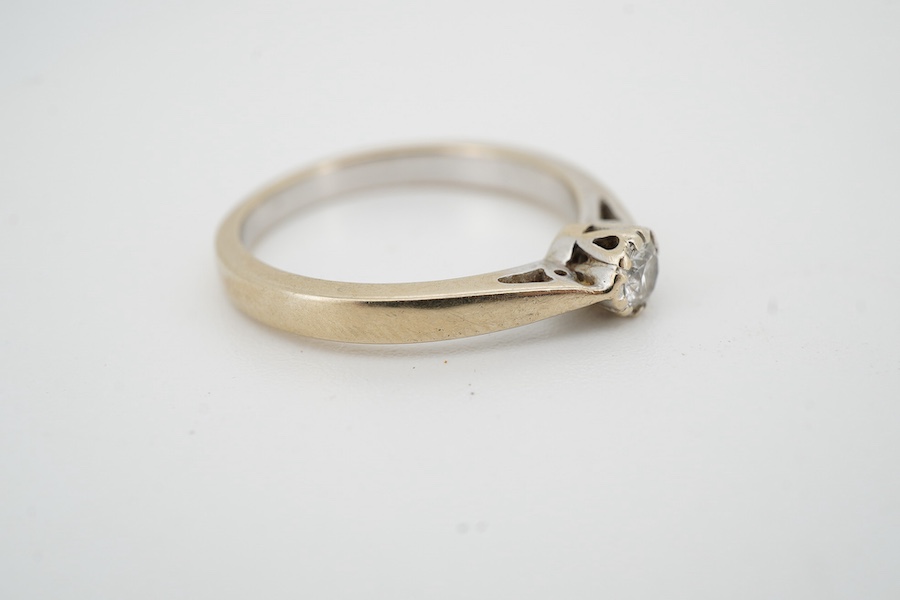 A diamond solitaire ring, claw-set with a brilliant-cut diamond weighing approximately 0.15 carats, mounted in 18ct gold, size N, British hallmarks, gross weight approximately 3 grams